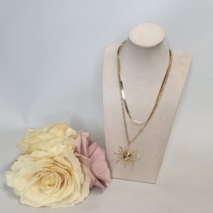 CHARMAINE - GOLD SUN PENDANT AND CHAIN .