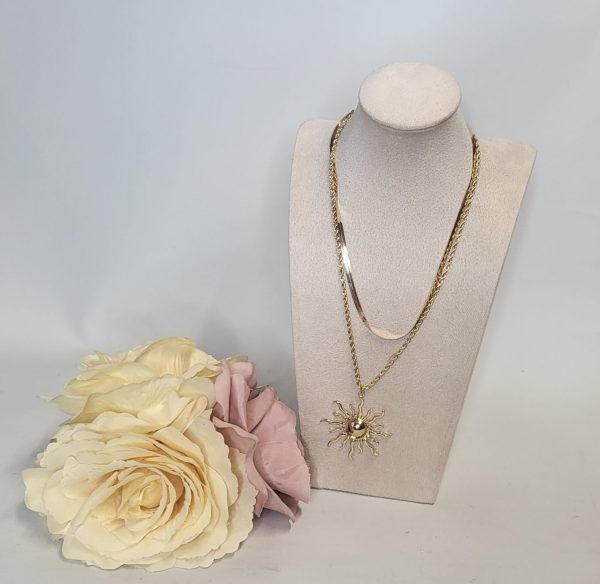 CHARMAINE - GOLD SUN PENDANT AND CHAIN .