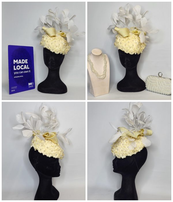 MERLINA - PALE YELLOW ,AND PEARL FASCINATOR WITH FLOATING IVORY FEATHERS